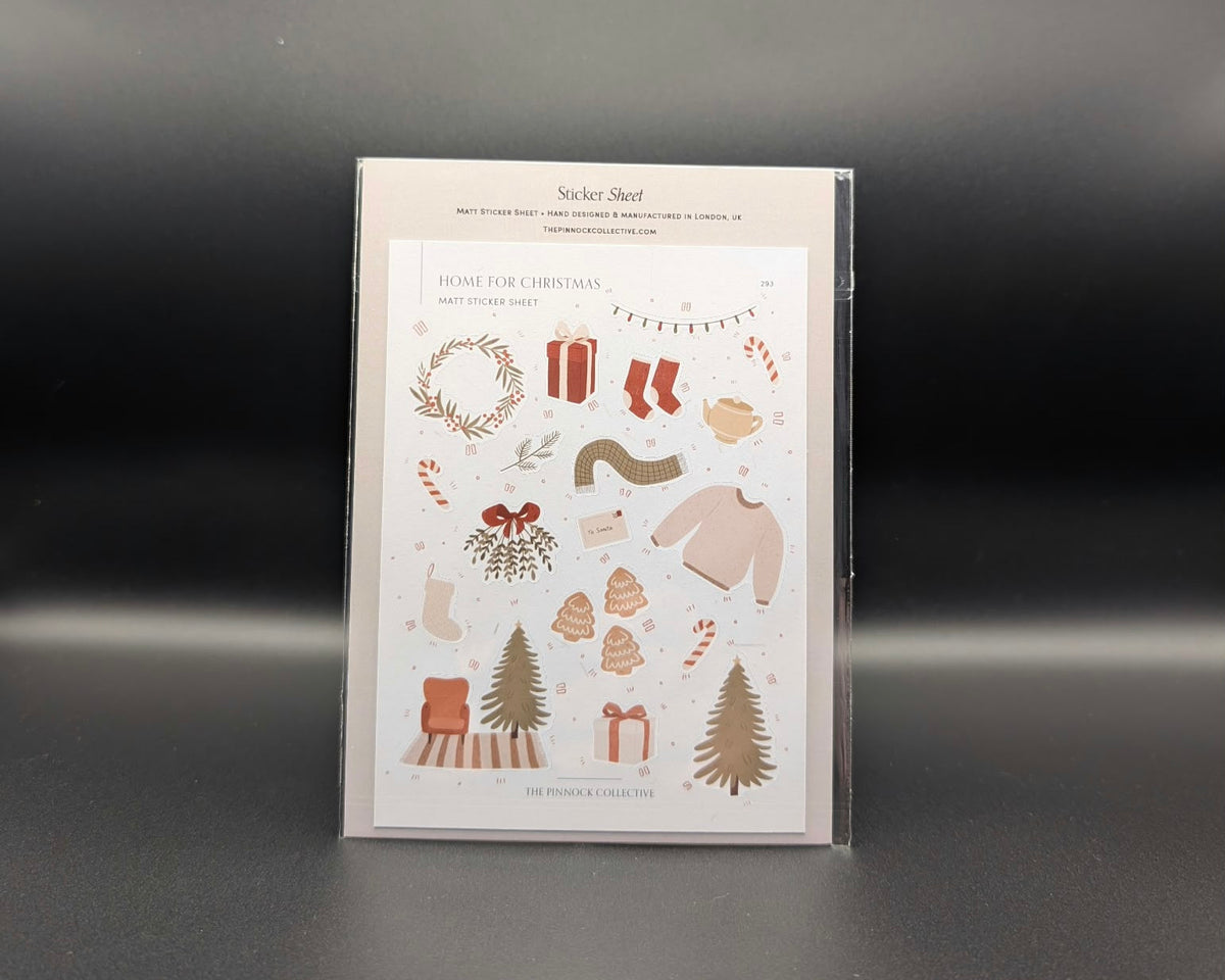 A6 'home for Christmas'-themed sticker sheet by The Pinnock Collective. 