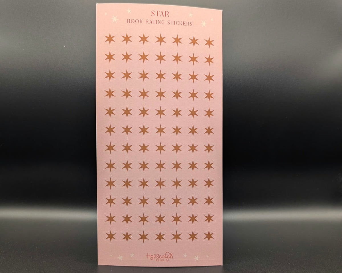 A pink sticker sheet with gold stars, titled 'Star Book Rating Stickers'. 