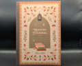A decorative reading journal with a warm autumn-themed cover illustration, featuring the title 'READING JOURNAL' in a central arch with leaves, stars, a lantern, and stacked books.